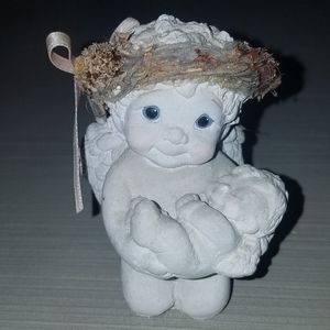 1994 Dreamsicles Angel on her knees holding baby